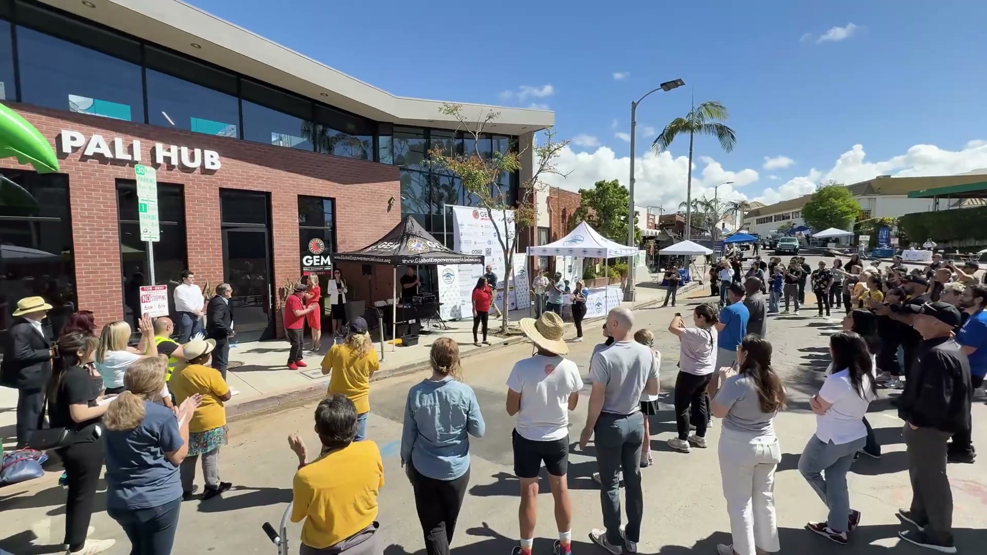 Community members outside the Pali Hub on opening day